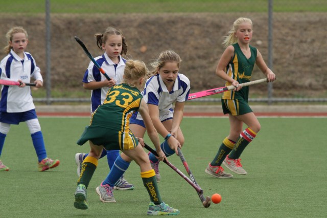 Norths player Kate Vickers clears the ball out of defence.